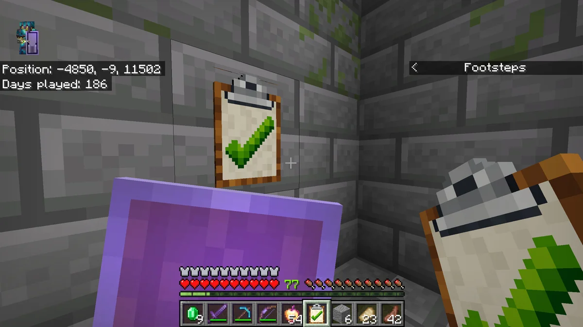 Author gameplay screenshot showing a held checklist and another mounted on a stone wall