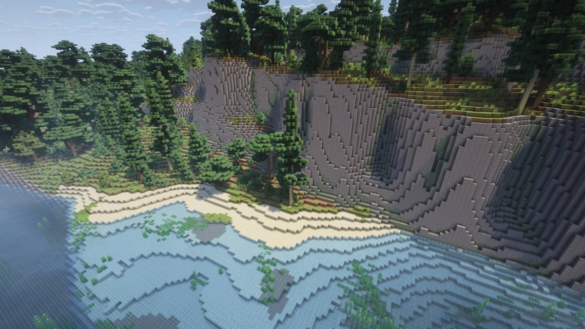 Rocky cliff above a narrow beach on Survival Island