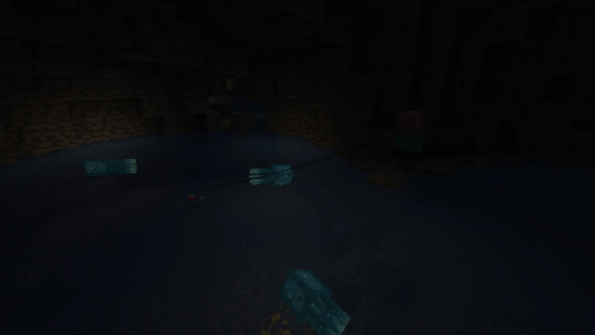 Glow squids lighting nearby underwater surfaces in the creator’s cave scene