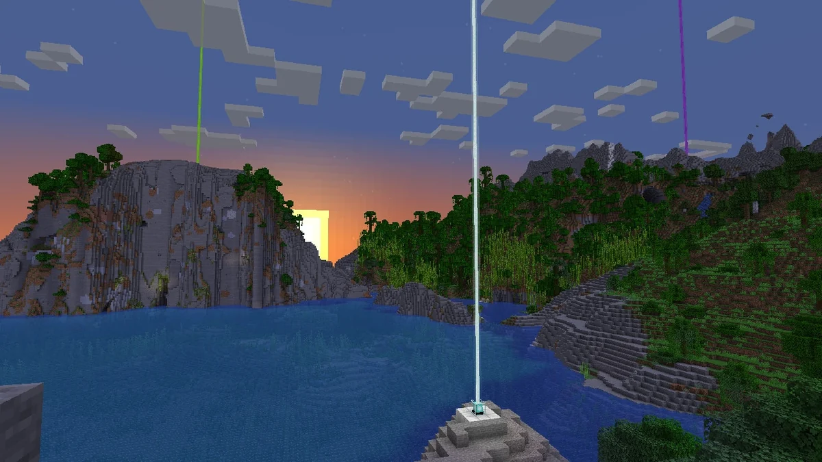 Three differently colored beacon beams across a wide mountain and river scene