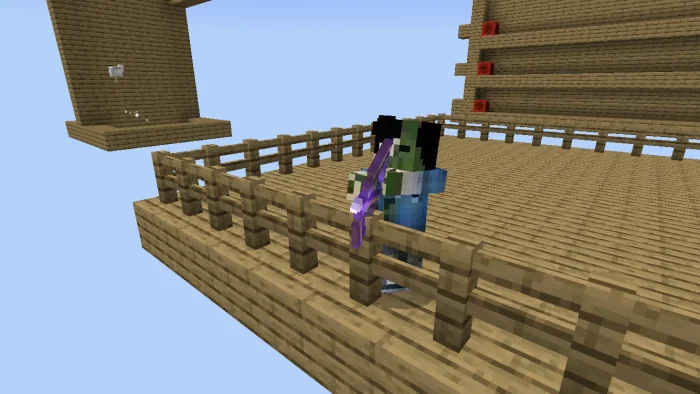 An archer on a wooden platform facing a practice target