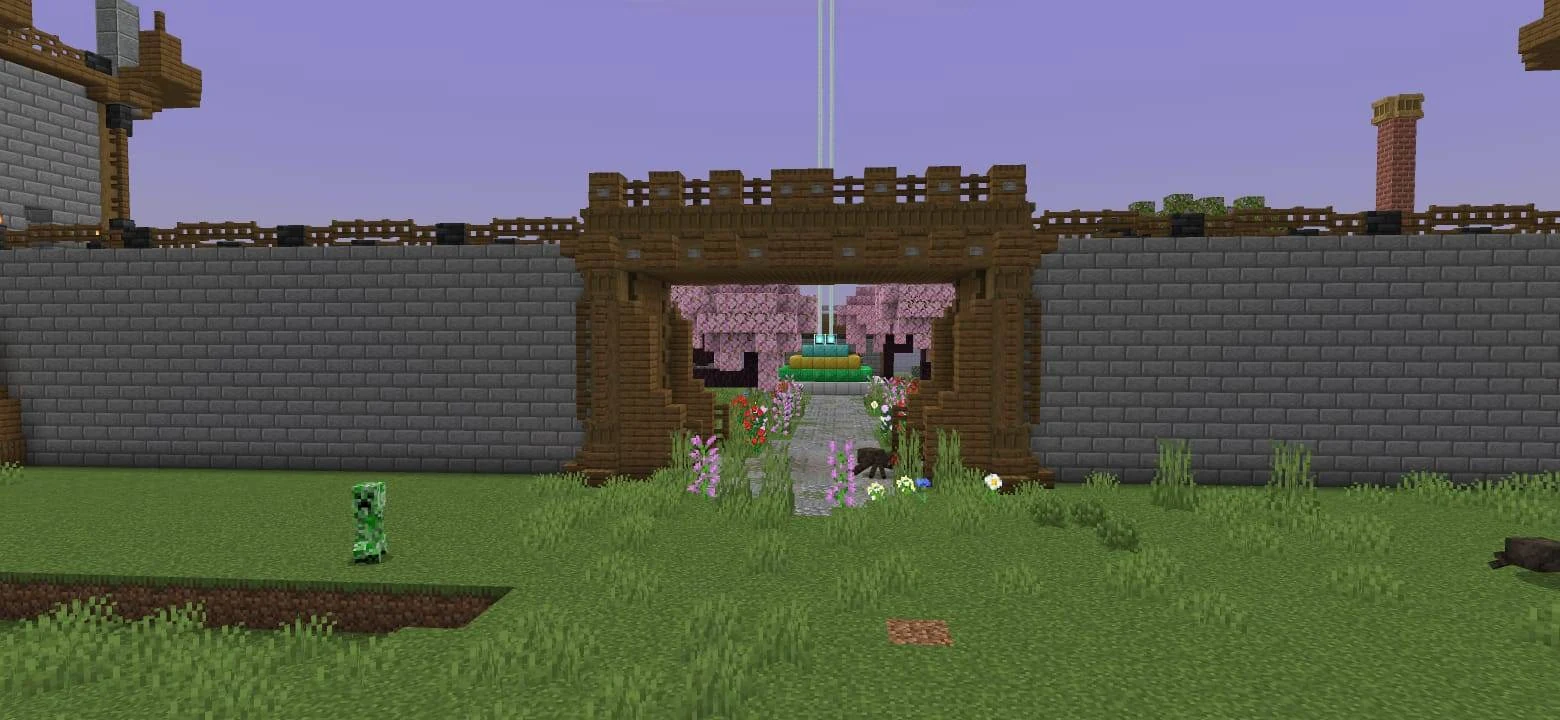Wooden entrance in a stone wall, opening towards cherry trees and a beacon
