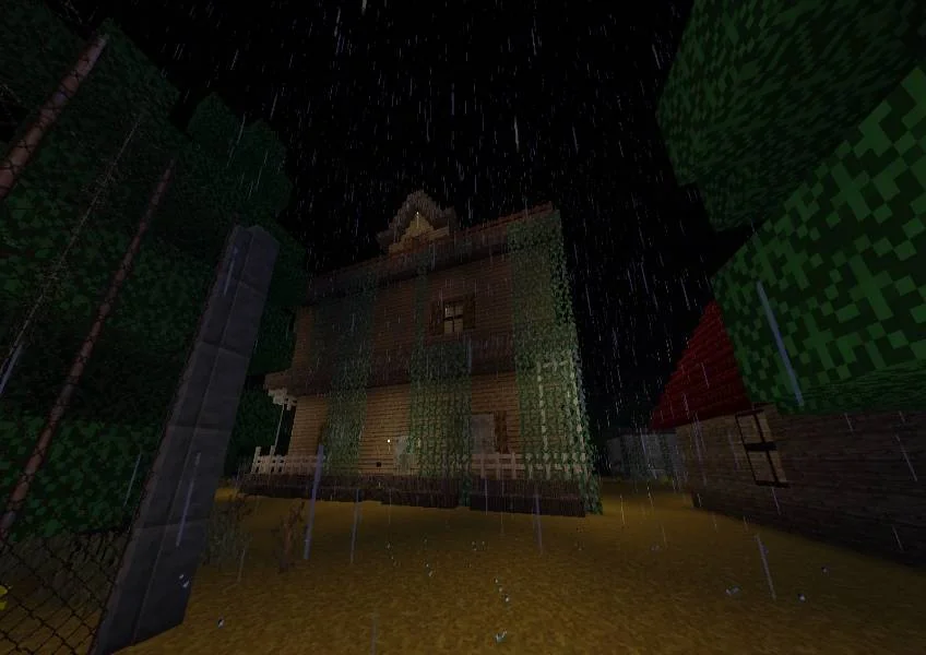 A dark multi-storey house seen from the street in heavy rain