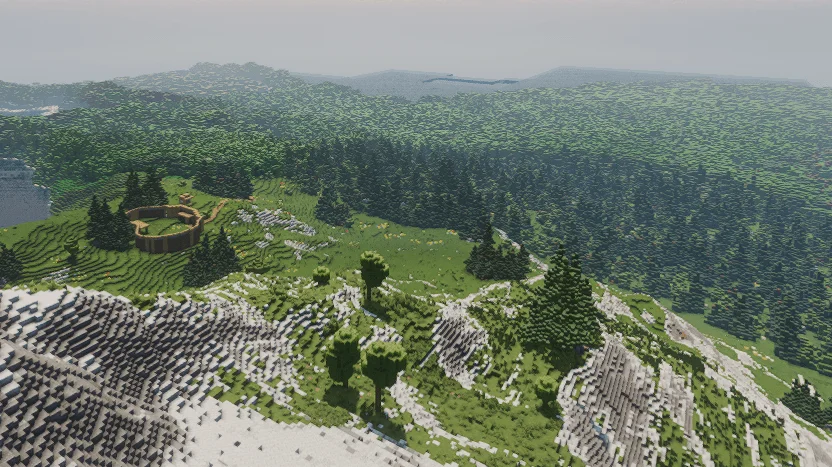 Forested island terrain with a rocky ridge and a walled settlement clearing