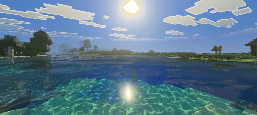 Turquoise shallow water and darker deeper water beneath a block-cloud sky