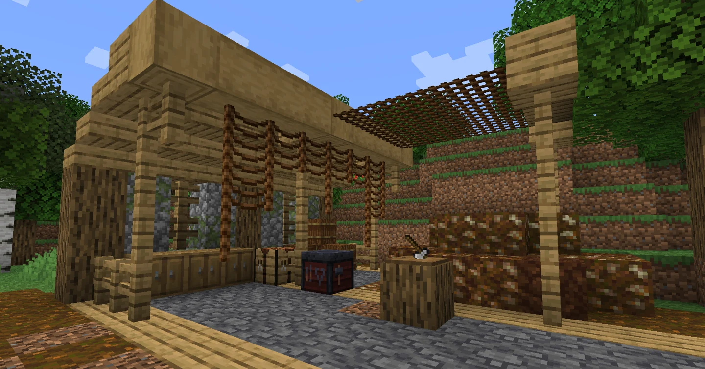Outdoor work area with rope supports, a cutting board and compost blocks