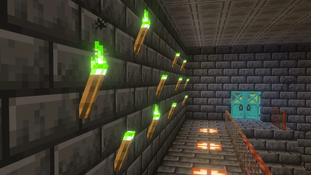 Green-flame copper torches and copper railings in a stone building