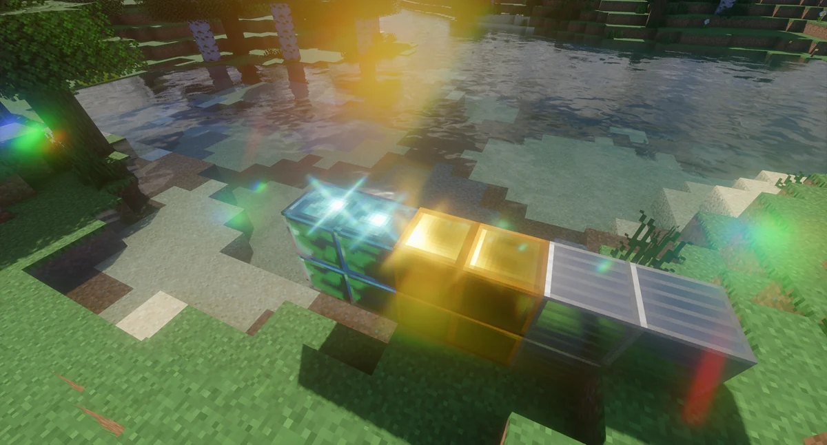 Strong colored glare on bright reflective blocks beside water