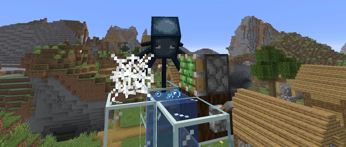 Mojang RC1 screenshot showing a squid above a bubble column beside a cobweb and sticky piston