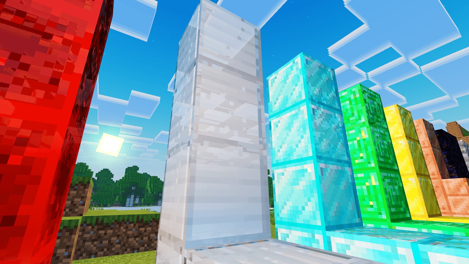 Tall redstone, iron, diamond, emerald and gold block columns showing reflective surfaces