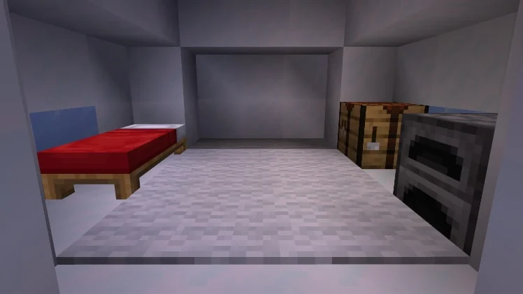 Mojang example of an igloo interior with a bed, carpet, crafting table and furnace
